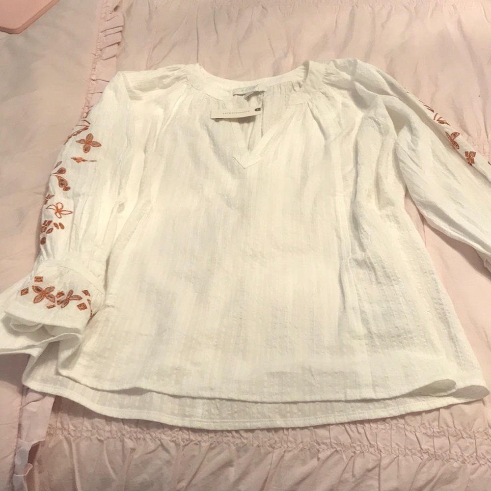Anthropologie white tunic with bronze stitching